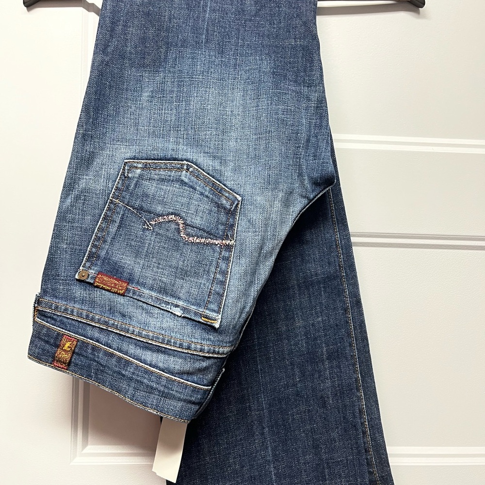 7 For All Mankind Bootcut Jeans in Faded Blue Denim